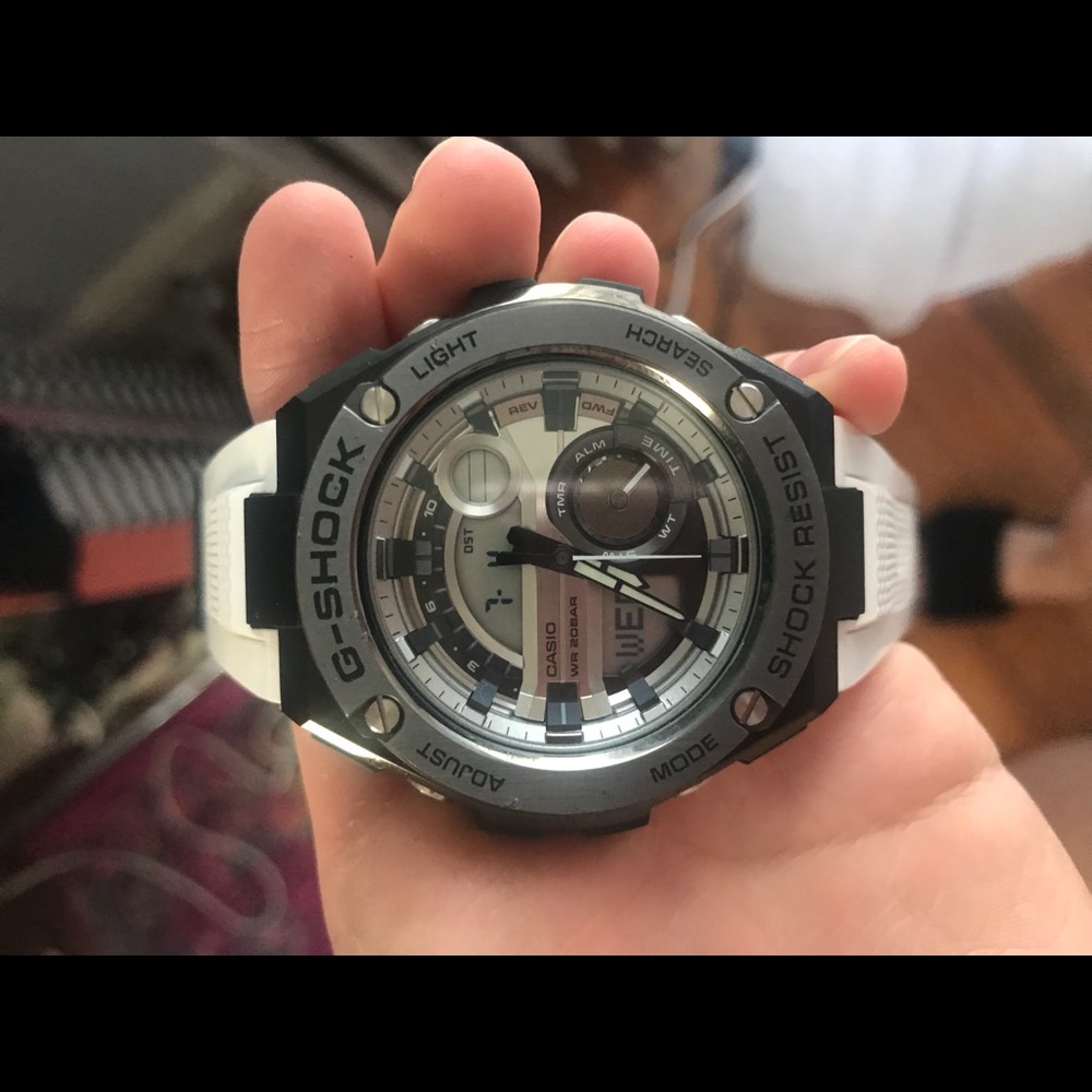 White and black g-shock watch